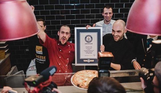 Berlin chef bakes cheesiest pizza in the world with 111 different types of cheese