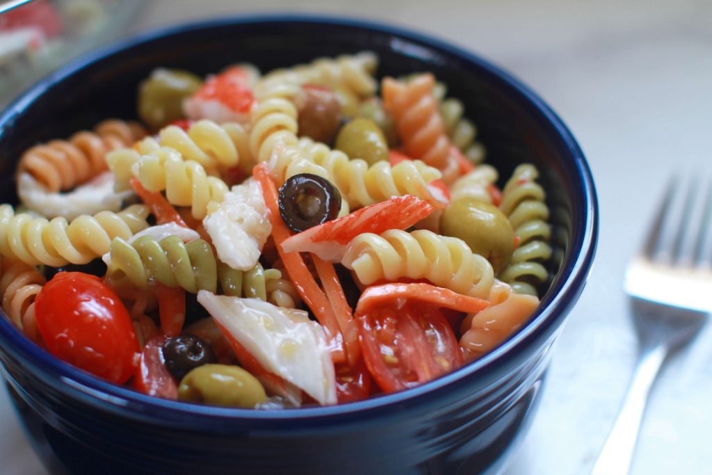 Tri-colored rotini and crab pasta salad