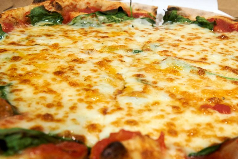 Berlin chef bakes cheesiest pizza in the world with 111 different types of cheese-1