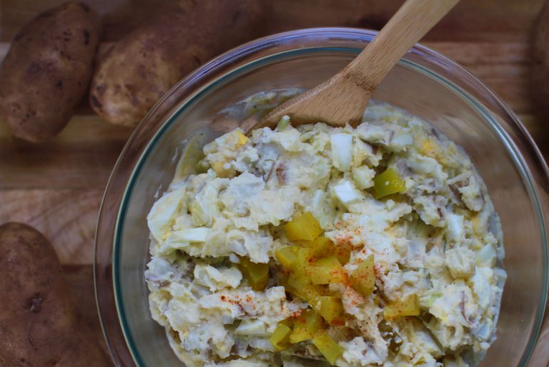 Dill pickle potato salad is a new take on a picnic time classic