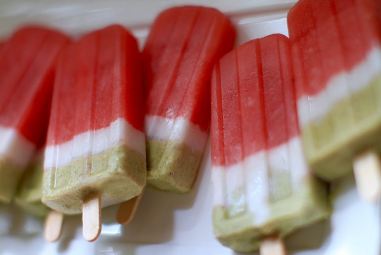 Watermelon layered popsicles are a perfect summer treat by Everybody Craves.