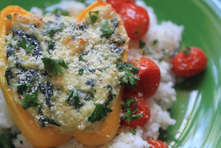 Vegetarian stuffed peppers made with spinach and ricotta.
