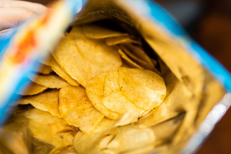 There's a good reason potato chip bags are always packaged half empty