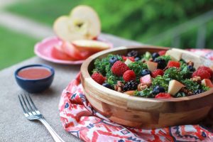 Triple berry kale walnut salad celebrates summer